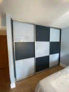Checker board design in white glass and alby blue panel with champagne frames, fitted in Eaglescliffe